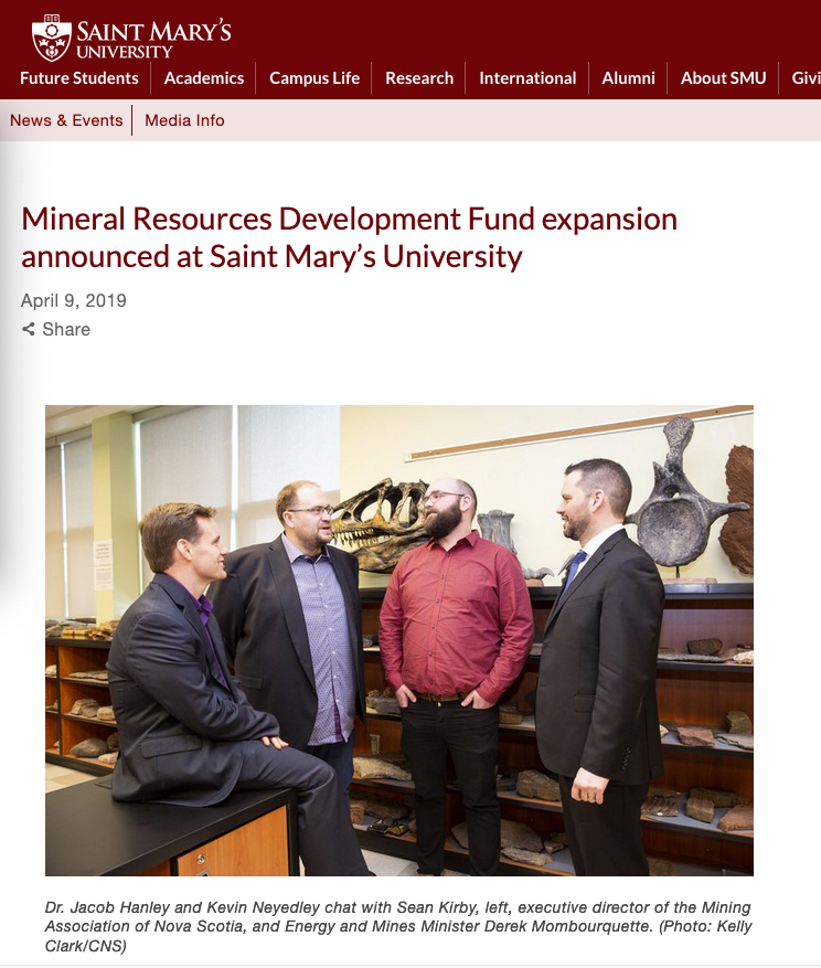 Screenshot from a 2019 photo on SMU website showing MANS executive director Sean Kirby (left), Saint Mary’s professor Jacob Hanley, student Kevin Neyedley, and then Department of Energy and Mines Minister Derek Mombourquette (right). Photo Kelly Clark/CNS