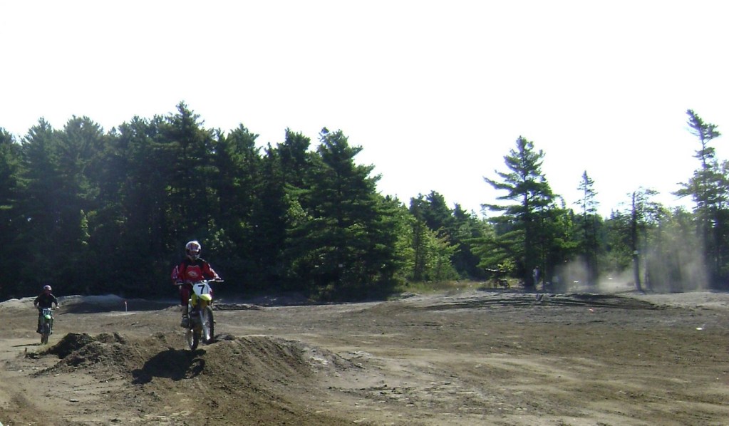 Someone on a dirt bike is seen riding over a bump that has been created on the historic mine tailings at Montague Gold Mines site in Dartmouth. Photo: Michael Parsons