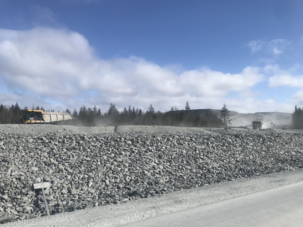 Huge trucks on dusty gravel roads at the Touquoy open pit gold mine in Moose River, Nova Scotia. Photo: Joan Baxter