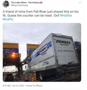 A tweet from Pat Healey that shows a large truck stuck in the tolls at the MacKay Bridge. The tweet says "a friend of mine from Fall River just shared this on his Facebook. Guess the counter can be reset. Oof."