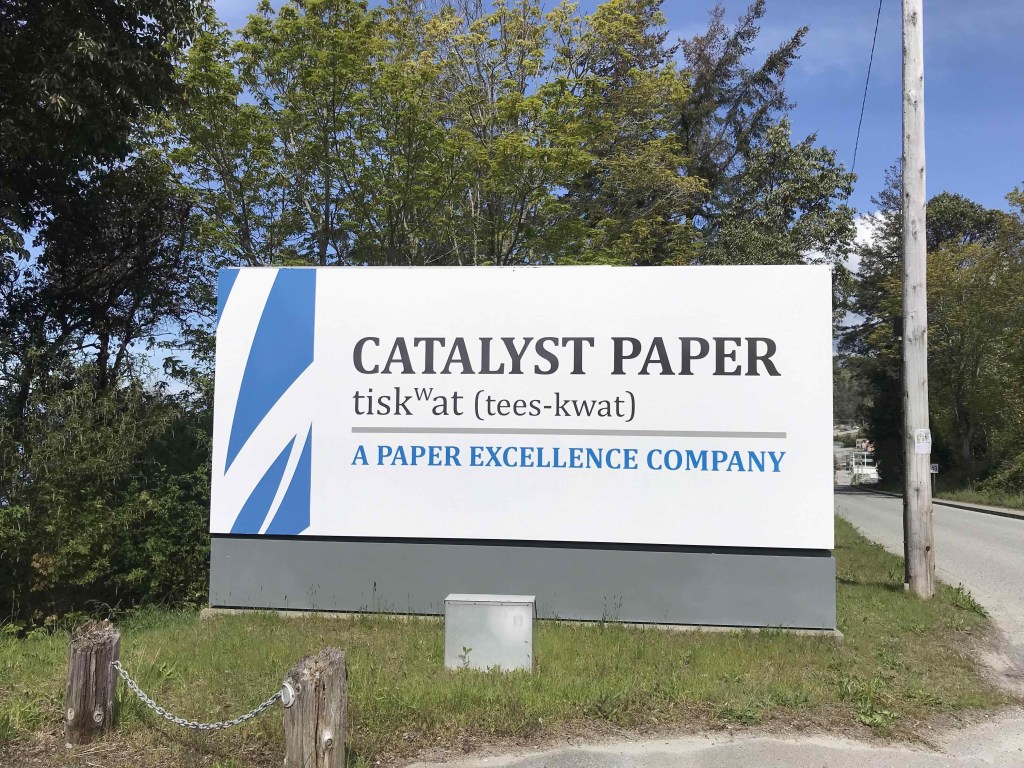 This large sign in Powell River is for the Catalyst tiskwat pulp mill that Paper Excellence bought in 2019 and has now closed. Photo: Joan Baxter